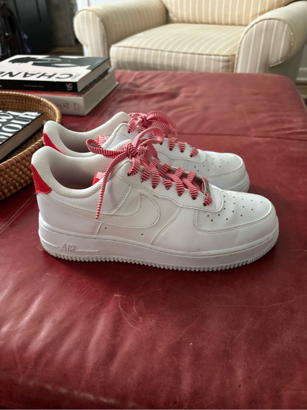 Nike women’s Air Force Ones with red accents and laces. Like new.